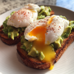 coffee shop style avocado toast with poached eggs